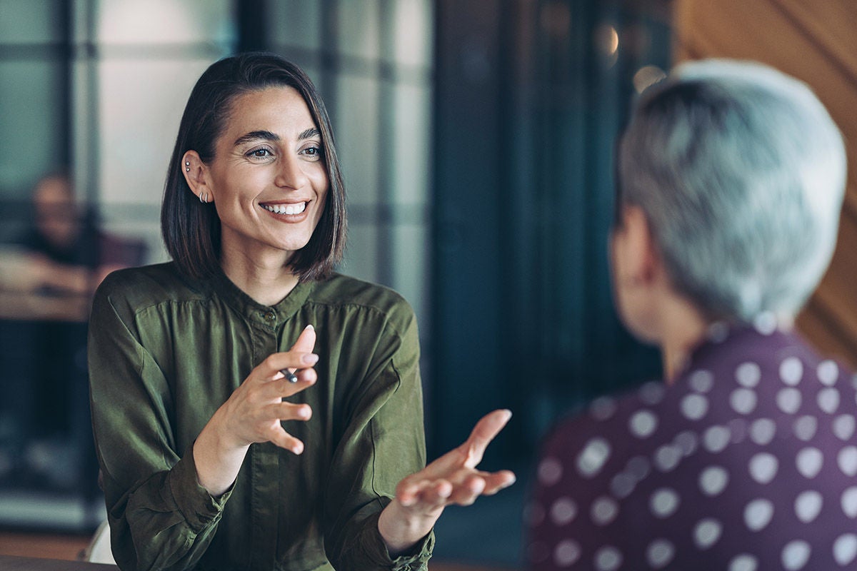 Financial advisor talking to a member about financial well-being